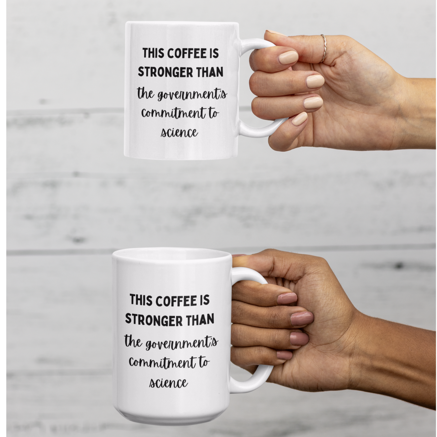 11 & 15 oz white ceramic coffee mug featuring a humorous and bold printed message in black typography. The text reads, "THIS COFFEE IS STRONGER THAN the government's commitment to science," with varying font styles—bold uppercase for emphasis and cursive script for a playful contrast.