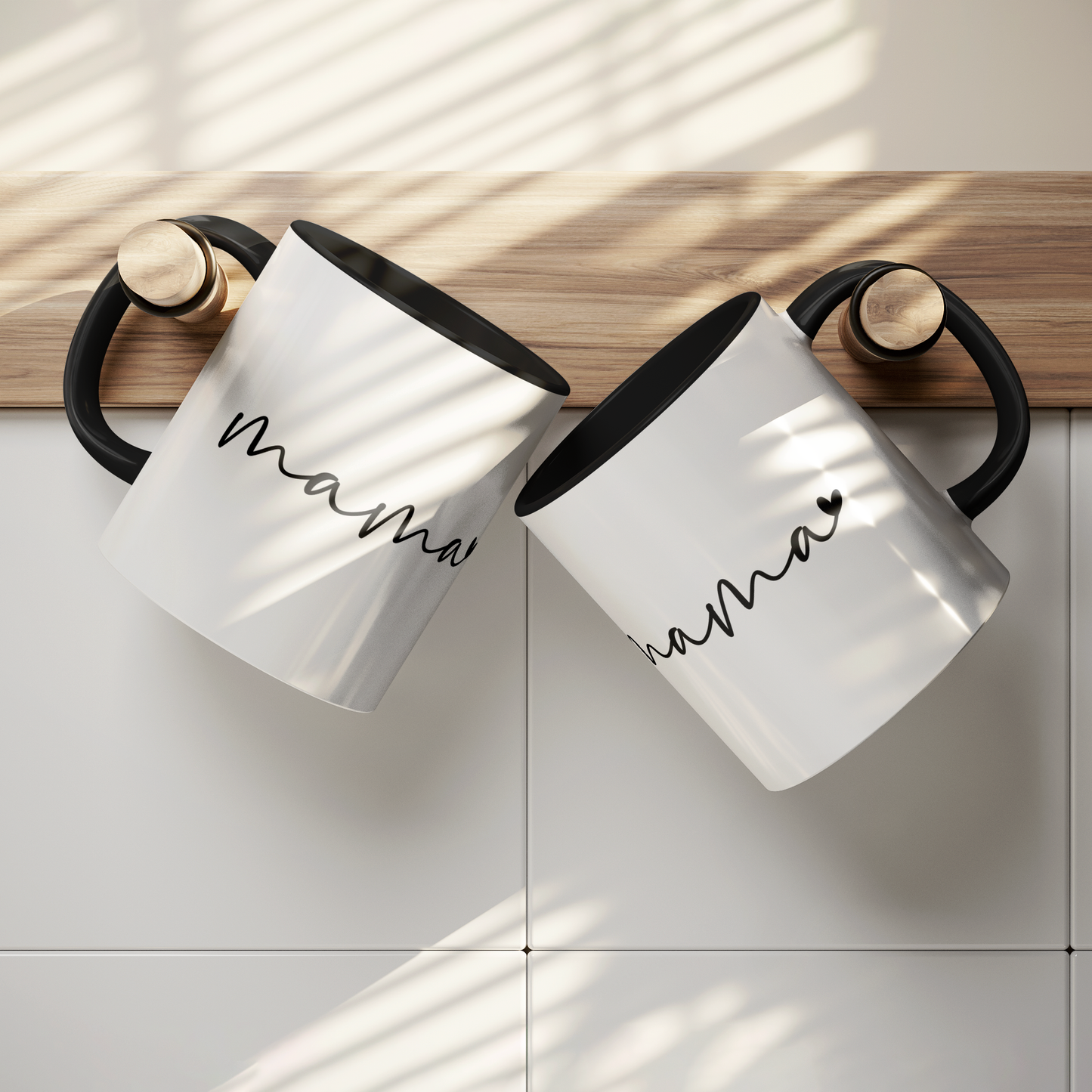 Modern 11 oz white ceramic mug with a sleek black interior and matching black handle, featuring elegant handwritten-style text that says “mama” with a small heart accent. Perfect for gifting to stylish moms who appreciate minimalistic design with a heartfelt touch — ideal for Mother’s Day, birthdays, or everyday coffee moments.
