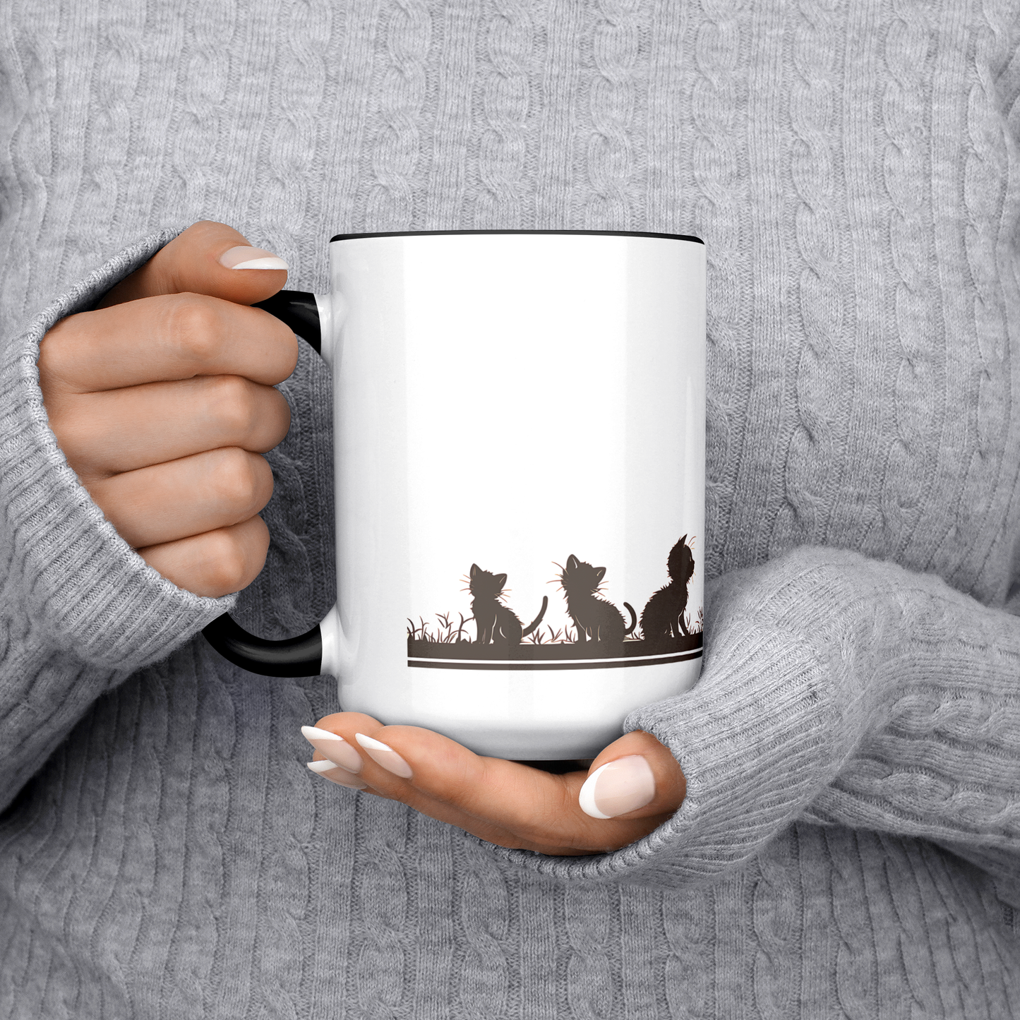 Stylish white ceramic mug with black handle and interior, featuring a wraparound black silhouette design of a papa cat sitting serenely with four playful kittens in a grassy meadow. A butterfly hovers gently above, adding a whimsical charm to the heartwarming scene. The artwork spans the full circumference of the mug, making it visually engaging from all angles. Perfect gift for cat dads, feline lovers, and anyone who appreciates cozy, artistic, pet-themed drinkware. Durable and dishwasher-safe.