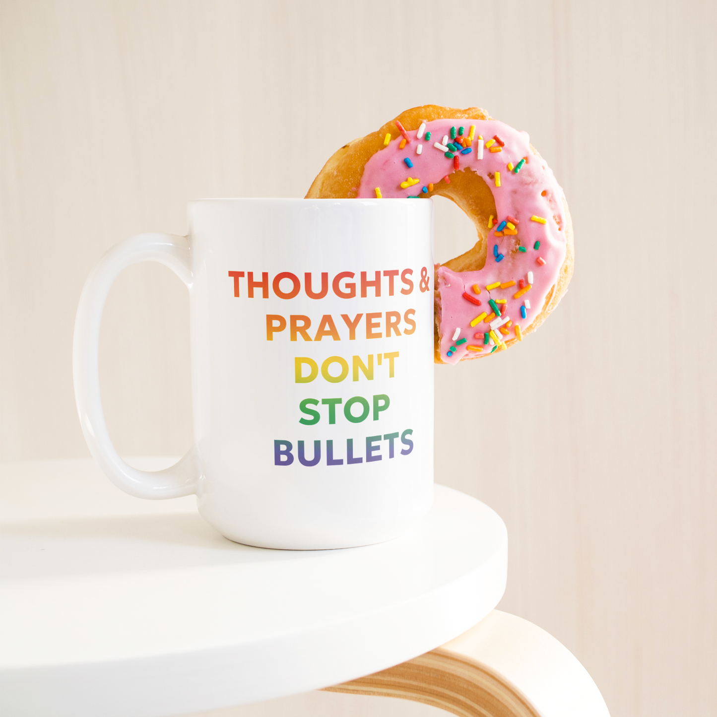 Rainbow_Ombre_Coffee_Cup-_Thoughts__Pr_15ozWhiteMugLifetsyleDonutLH_Mockup.png