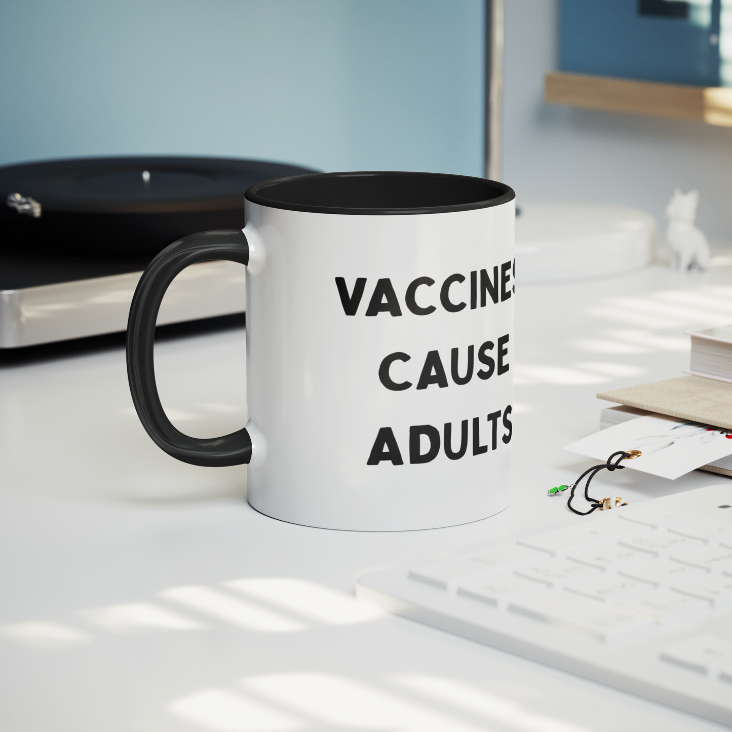 Science_Coffee_Mug__Vaccines_Cause_Mug_Lifestyle_Record_Player_Mockup.png