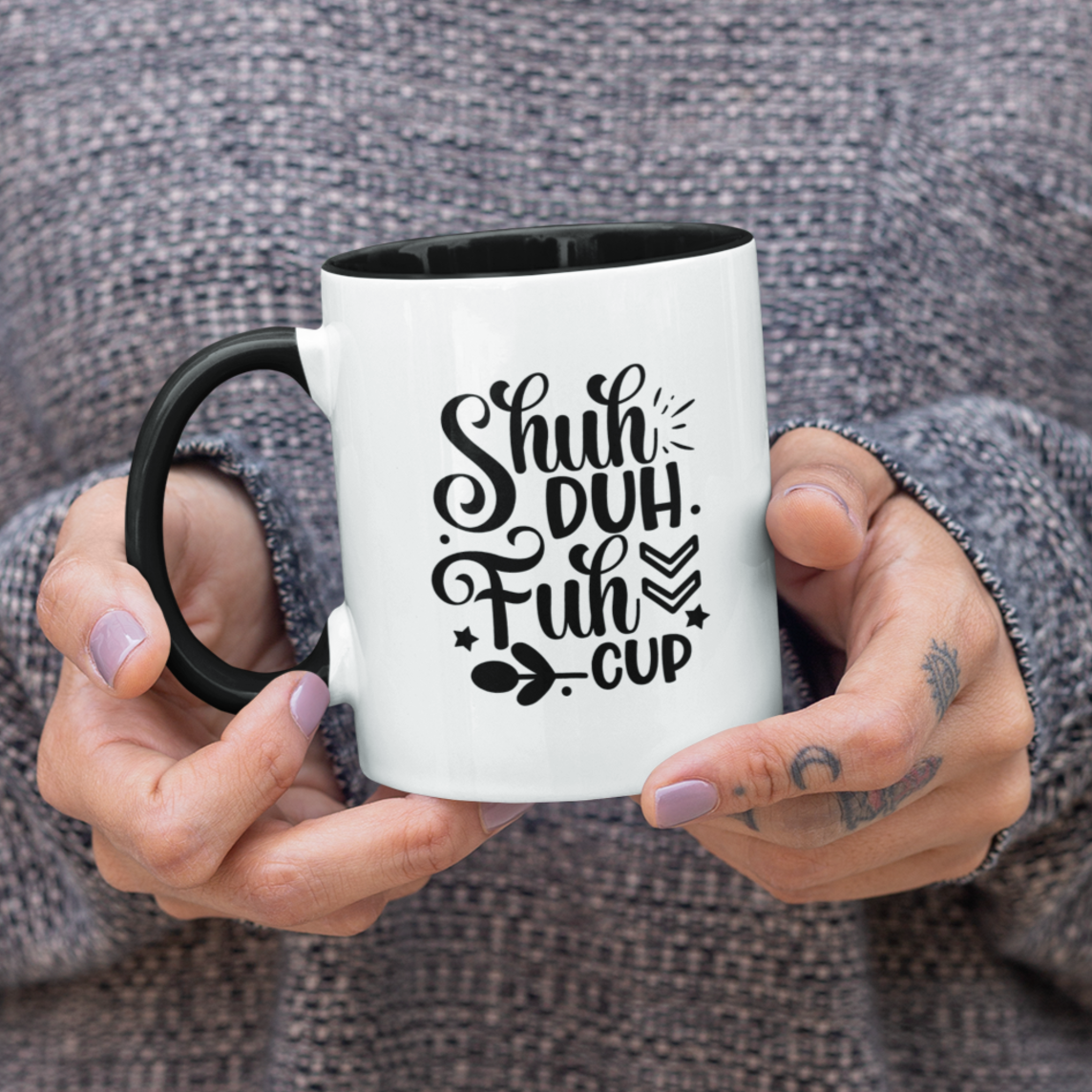 Bold and cheeky white ceramic mug with a black handle and rim, featuring the humorous phrase “Shuh Duh Fuh Cup” in a playful black script with decorative arrows, stars, and leaves. This mug is perfect for coffee lovers with a sarcastic sense of humor. Durable, dishwasher and microwave safe—ideal for gifting or enjoying your morning brew with a side of sass.
