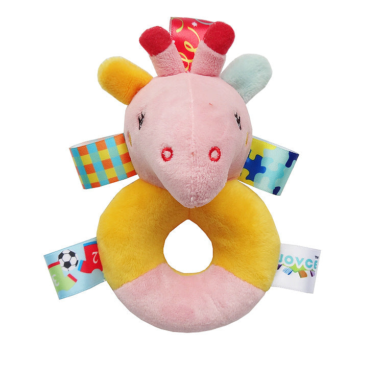 pink and gold plush rattle with circular plush handle for the body and multicolor sensory tags attached