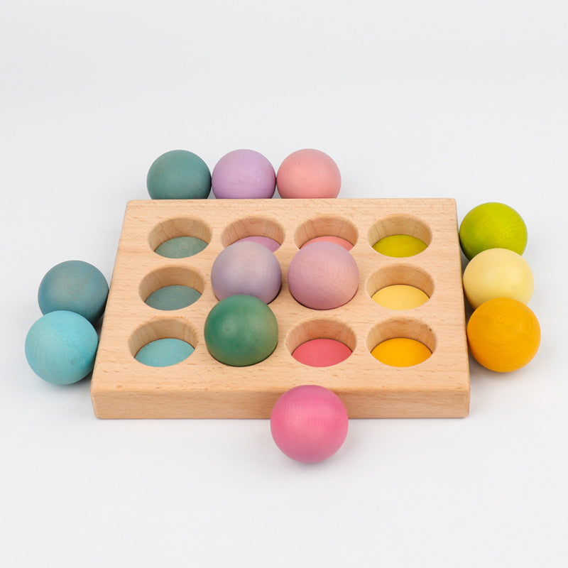 wooden tray with 12 openings for pastel colored balls with corresponding pastel colors in each opening