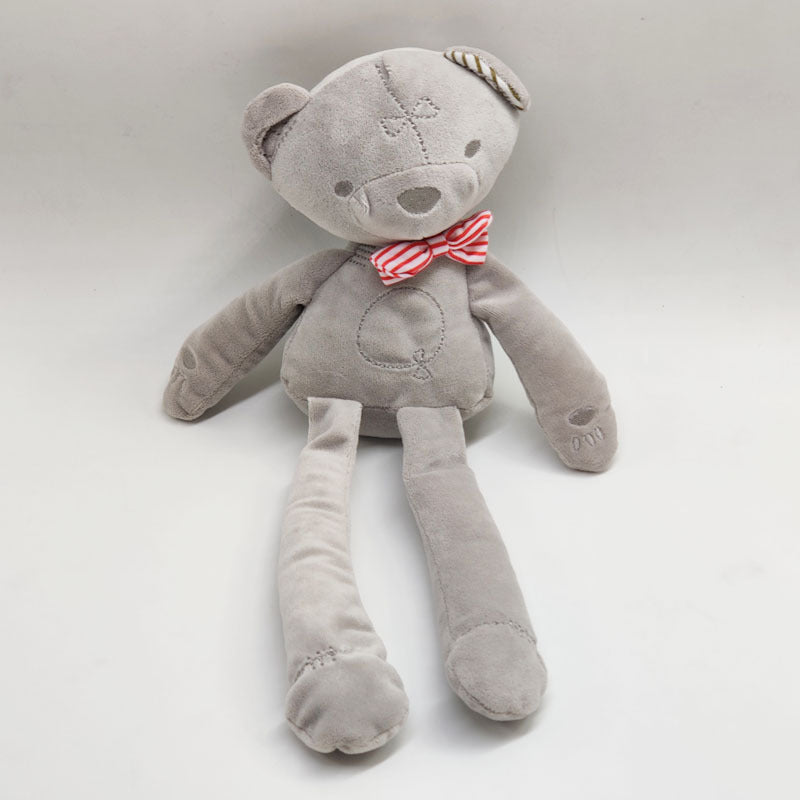plush gray bear with long arms and legs with red/white striped bowtie