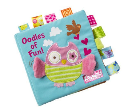 Image of plush book with owl on front called "Oodles of Fun". Cover is blue and the book has multiple fabric sensory tags attached