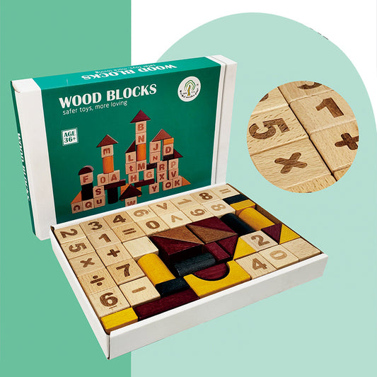 Blocks pictured in their original box. The blocks have numbers and math symbols on the cube shapes and some cylinders and triangles and other various shapes