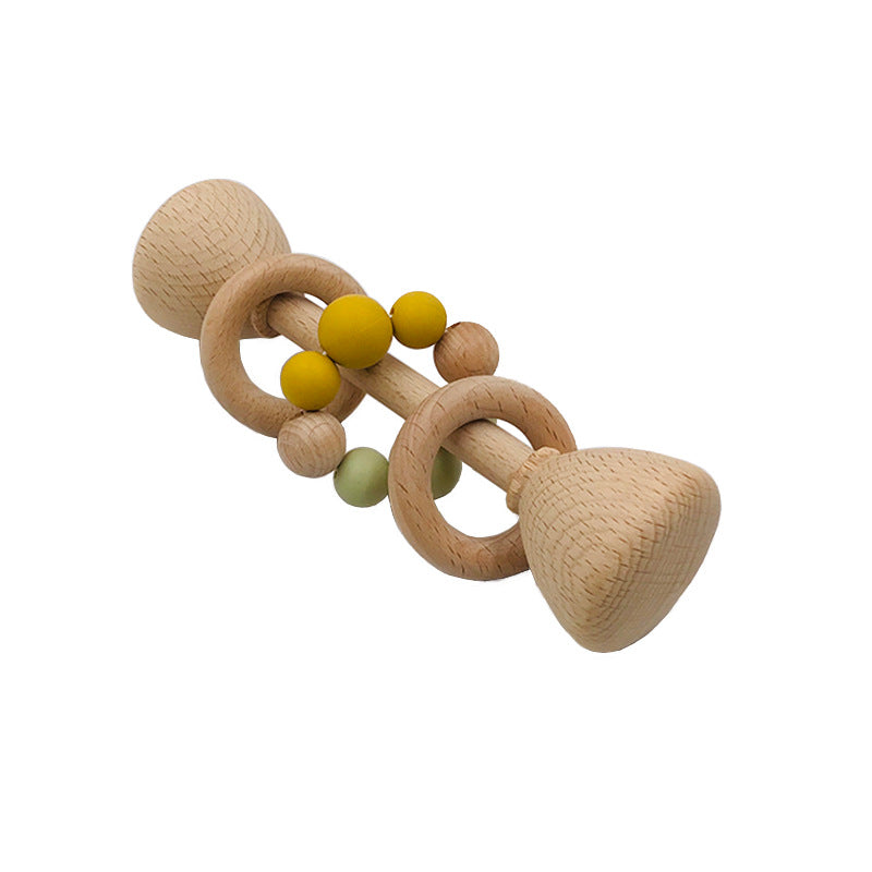 long rattle shaped like barbell with 2 wooden rings on the center handle and one with yellow and green beads
