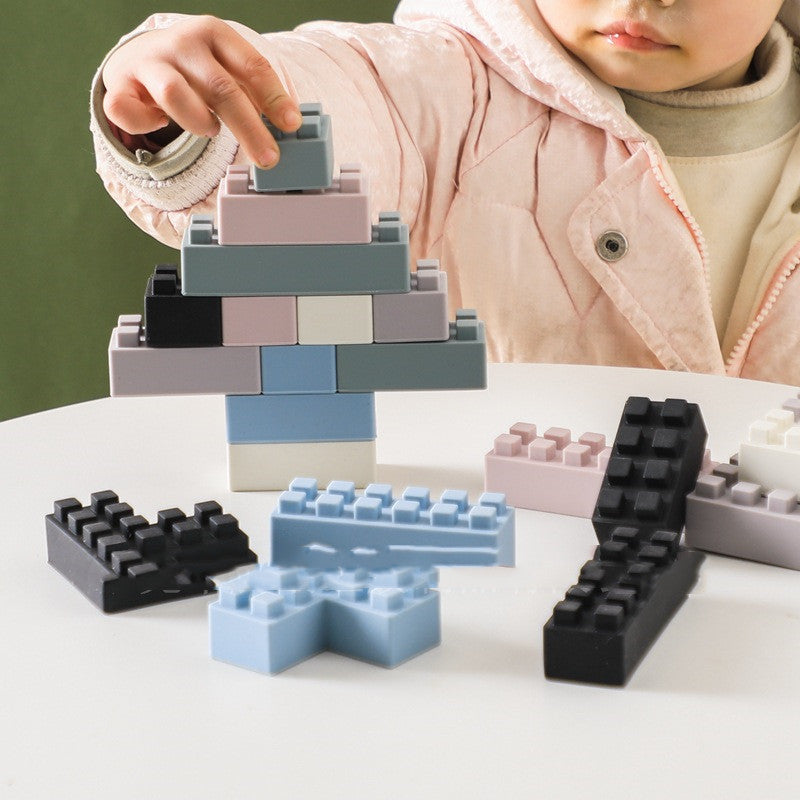 image of a child playing with silicone blocks