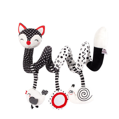 image of black and white spiral cat toy with red ears on the cat