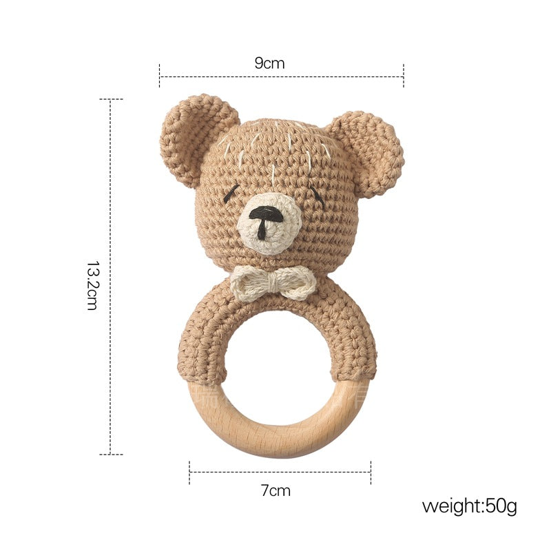 light brown bear crochet teething ring with natural wood handle with dimensions of 9 cm x 13.2 cm