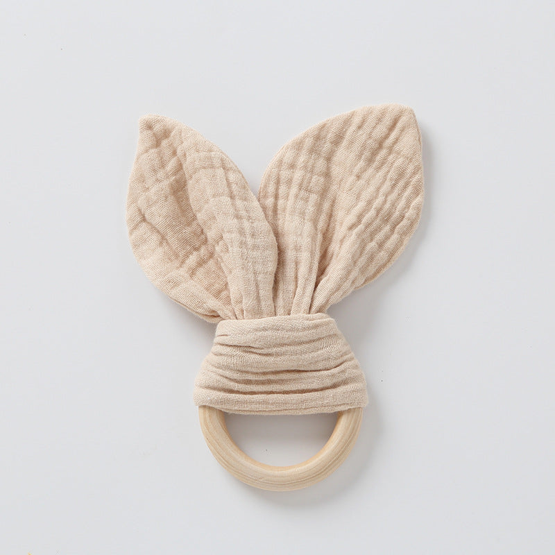 cream muslin bunny ears on natural wood ring