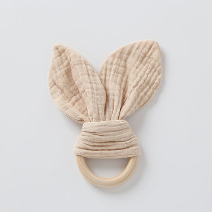 cream muslin bunny ears on natural wood ring