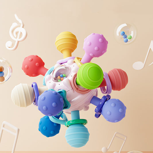image of sensory ball  with sensory knobs surrounded by musical notes