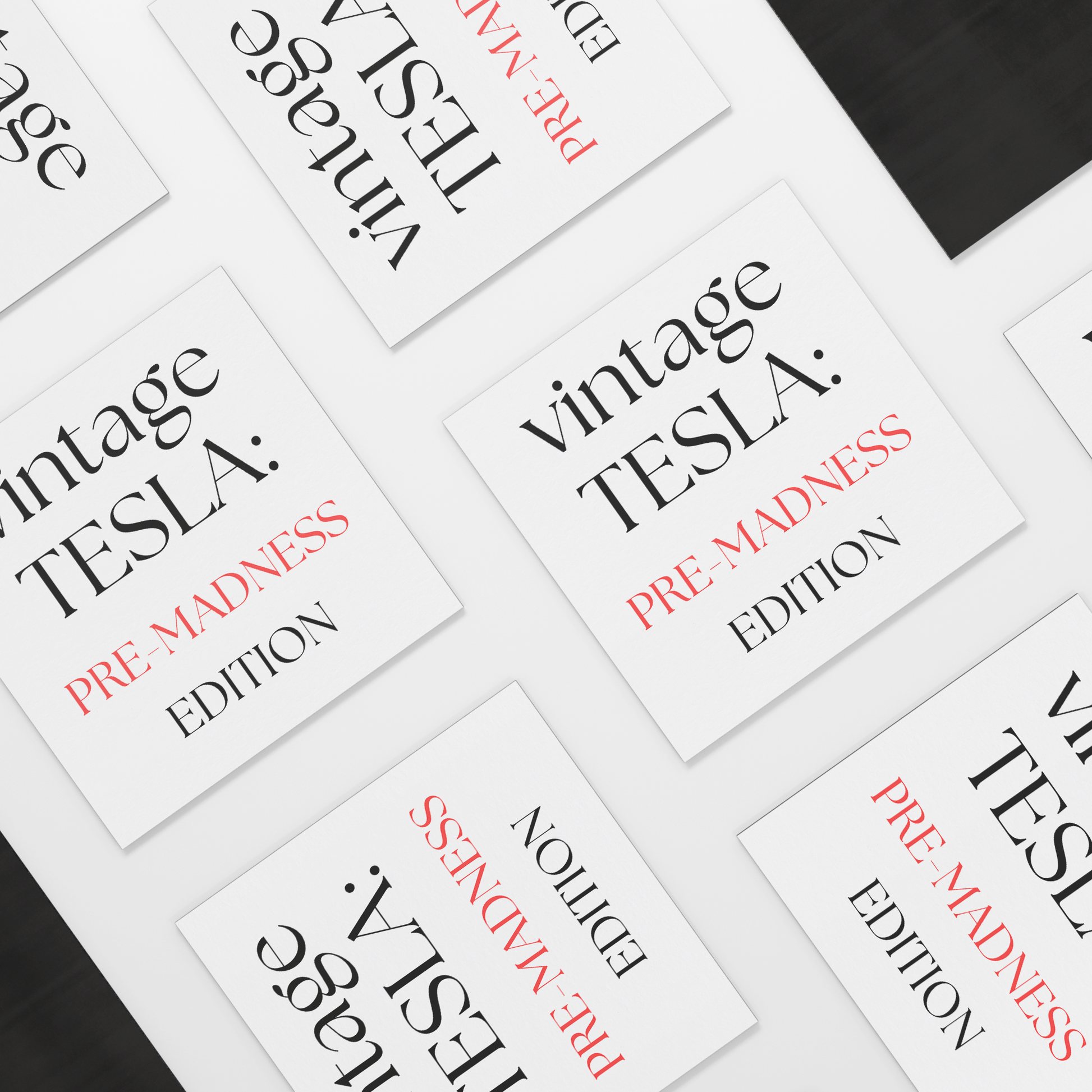 A square car magnet with a minimalist white background featuring stylish, modern typography. The text reads: "vintage TESLA: PRE-MADNESS EDITION." The word "vintage" appears in elegant black serif font, "TESLA:" is bold and capitalized in black, while "PRE-MADNESS" stands out in a striking red color, emphasizing contrast and intrigue. "EDITION" is centered below in black, completing the design. Perfect for Tesla enthusiasts who appreciate the early era before widespread popularity.