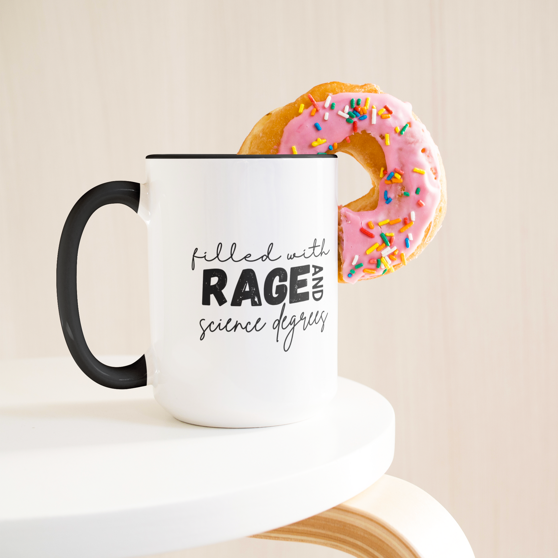 Filled_with_rage_and_science_degrees_mug_Lifestyle_Donut_LH_Mockup.png