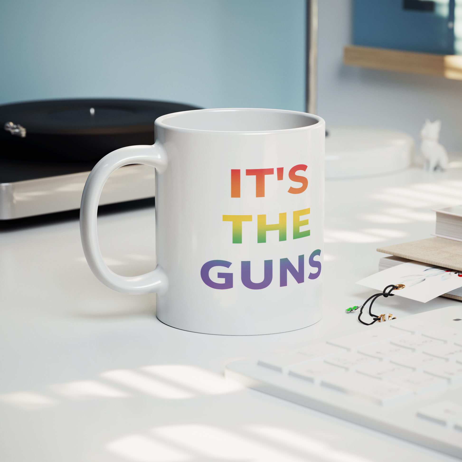 Its_The_Guns_Coffee_Mug_Supporting_Gun__Lifestyle_Record_Player_Mockup.png