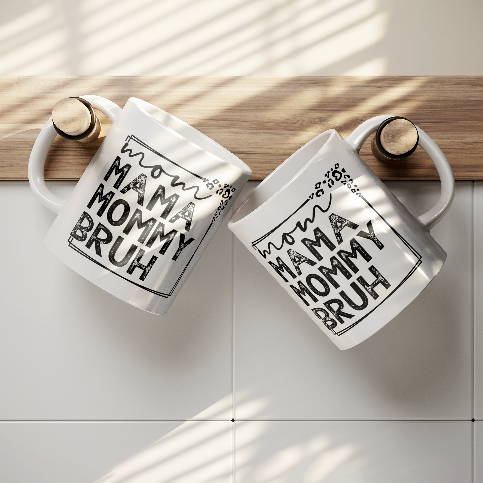 11 oz white mug displaying a playful design that reads "mom MAMA MOMMY BRUH" in black, framed with leopard print details. A funny gift for moms with a sense of humor.