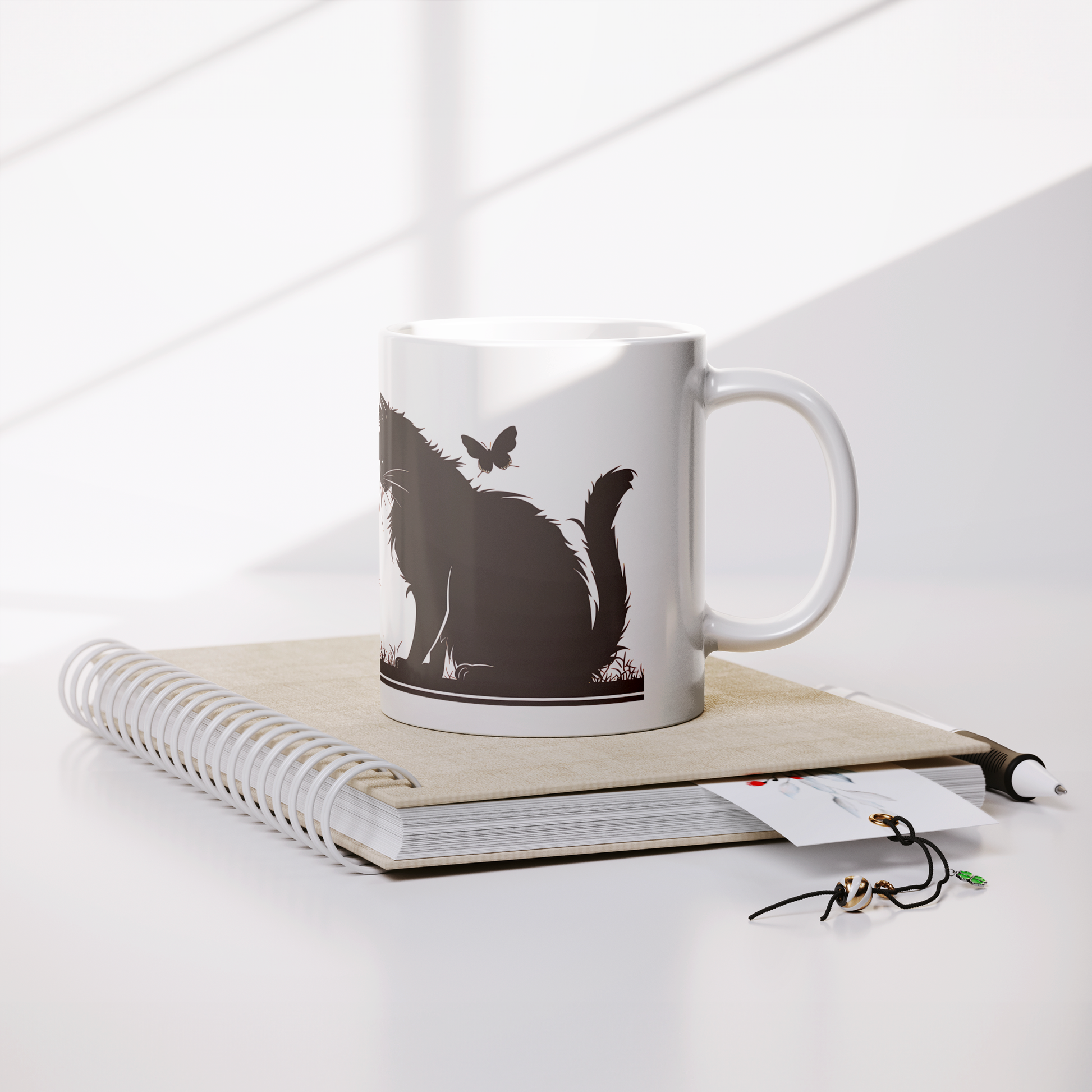 Charming white ceramic coffee mug featuring a heartwarming black silhouette design of a proud Papa cat watching over four playful kittens in a grassy setting. A butterfly flutters above, adding a whimsical touch to the peaceful scene. The wraparound artwork is beautifully printed across the surface, making it a perfect gift for cat Dad, feline lovers, or anyone who enjoys cozy mornings with a touch of pet-inspired charm. Durable, high-quality mug ideal for daily use or gifting.