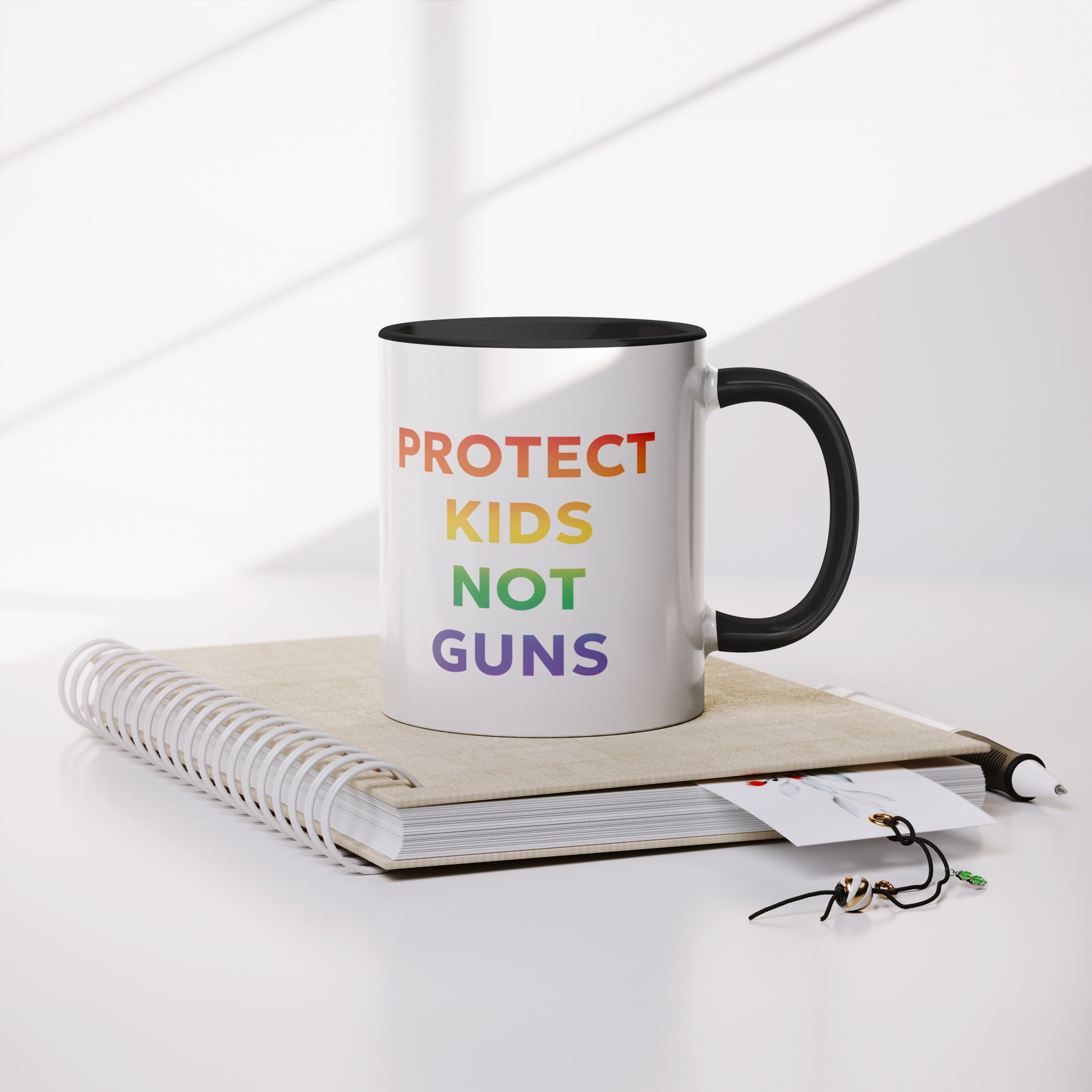 Rainbow_Ombre_Mug_with_Quote_Protect_Ki_Mug_Lifestyle_Notebook_Mockup.png
