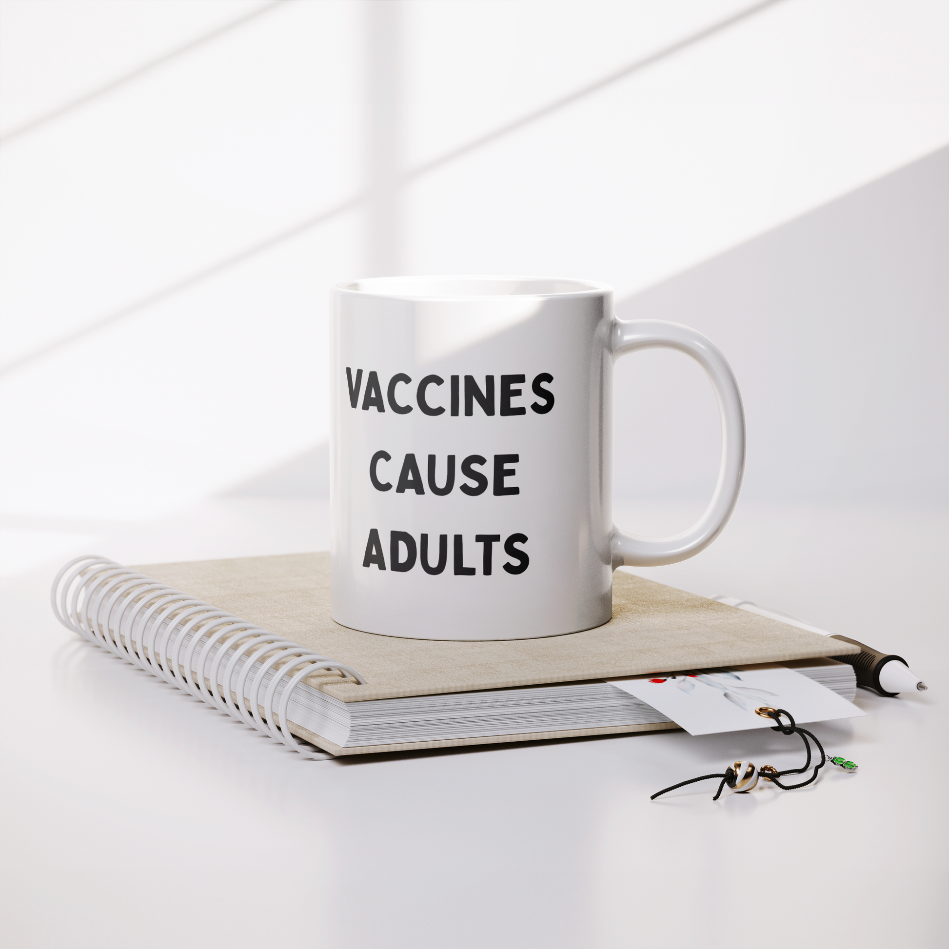 Science_Coffee_Mug__Vaccines_Cause_Lifestyle_Notebook_Mockup.png