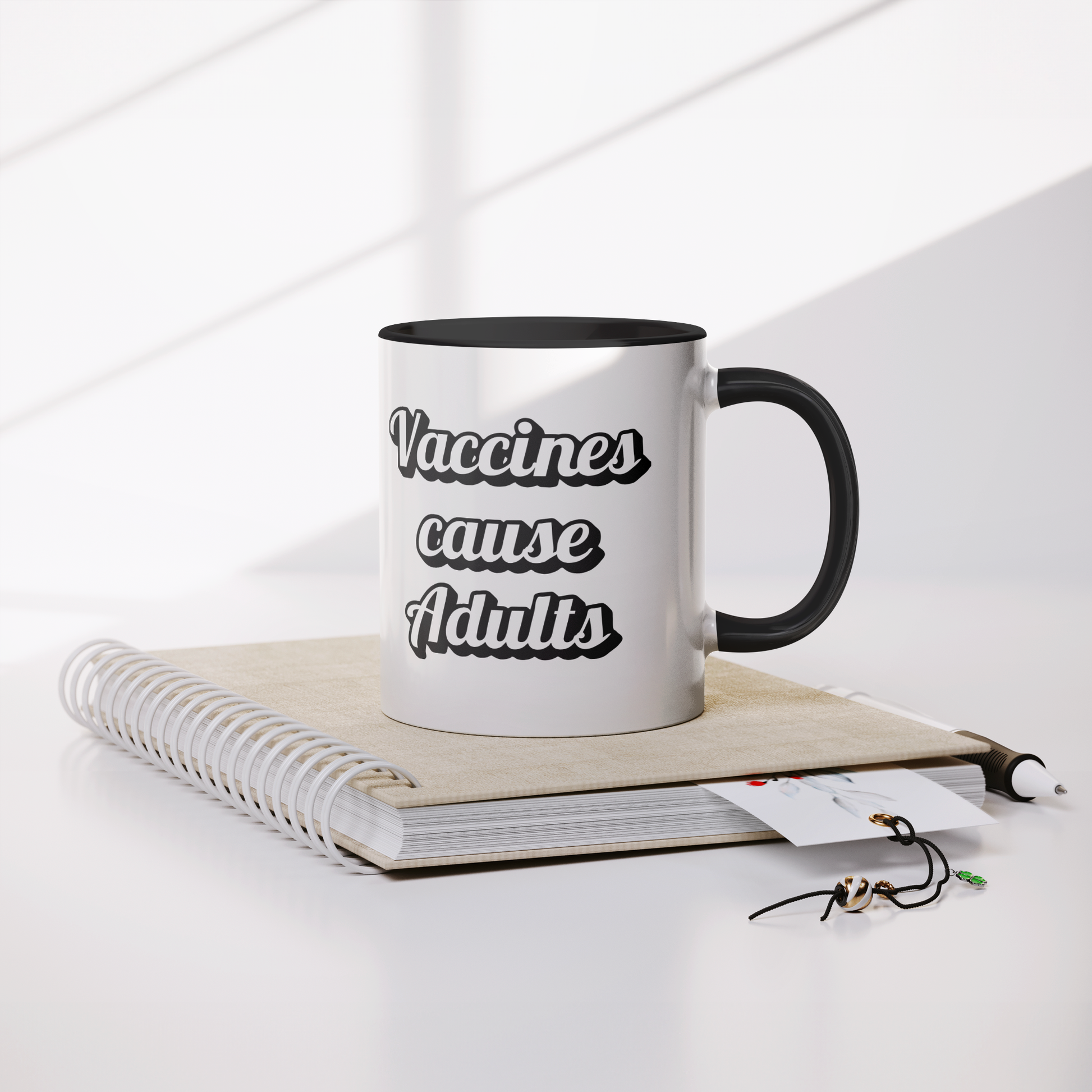 Science_Coffee_Mug__Vaccines_Cause_Mug_Lifestyle_Notebook_Mockup.png