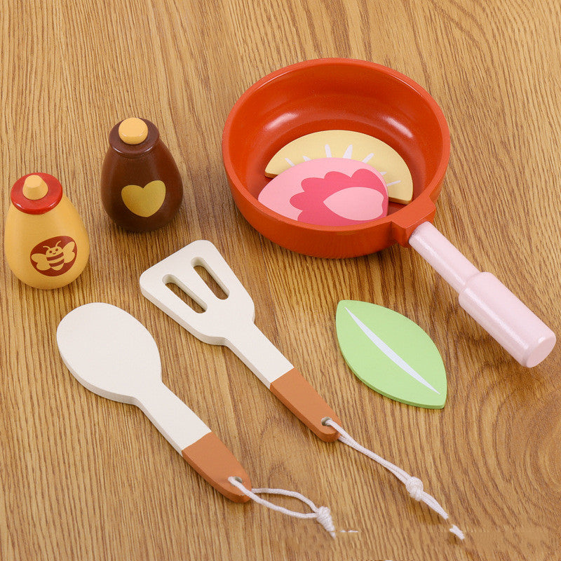 accessories that go with mini kitchen, honey pot, utensils, pan with food