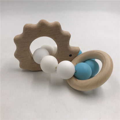 natural wood hedgehog teether with blue/ white beads