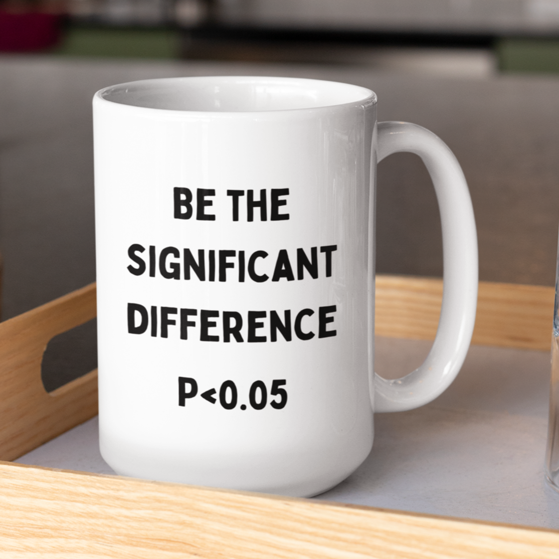 15 oz white ceramic coffee mug with black text on the front reads: "BE THE SIGNIFICANT DIFFERENCE" followed by the classic statistical notation "P < 0.05." The mug has a smooth finish and a sturdy handle, suitable for everyday use.