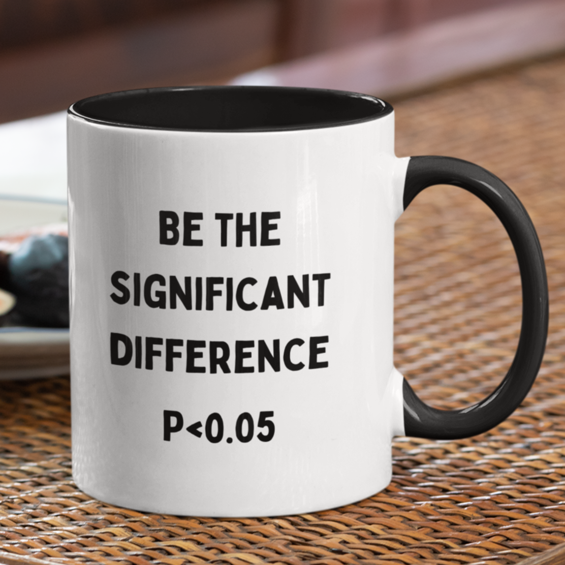 11 oz white ceramic coffee mug featuring bold black text that reads: "BE THE SIGNIFICANT DIFFERENCE P < 0.05." The handle and interior are a sleek matte black, adding a modern contrast to the bright white exterior. Ideal as a gift for academics or to add a bit of nerdy humor to your morning coffee routine!